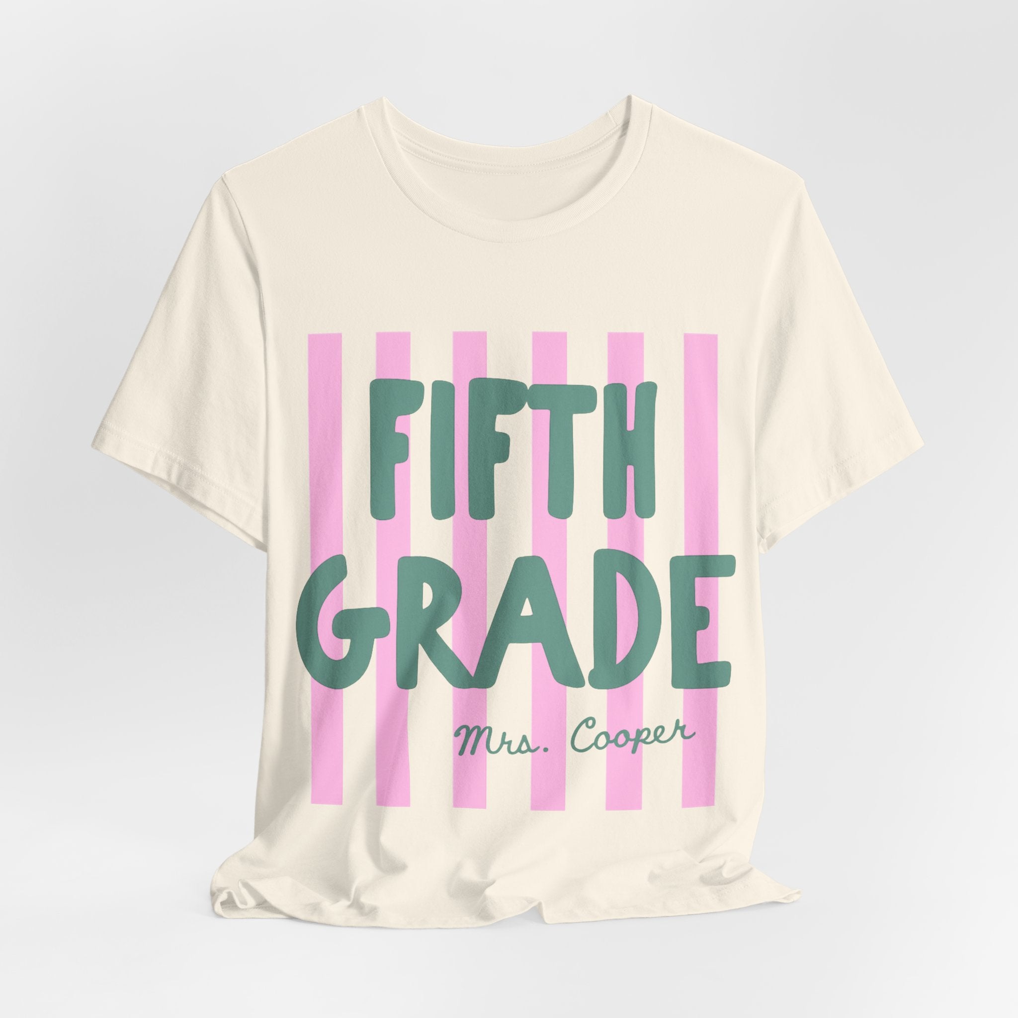 Off-white personalized striped teacher tee with custom grade and name text in green