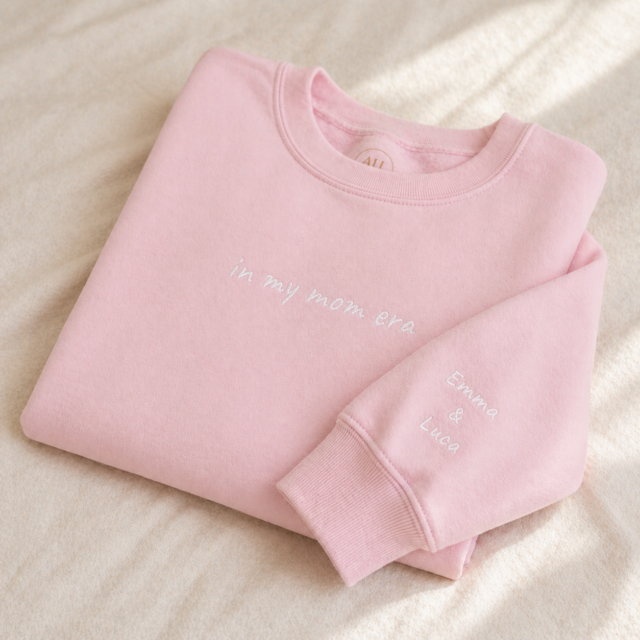 Close up embroidery in my mom era sweatshirt minimalist design