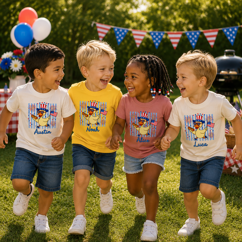 Four children running together with matching shirts in a grassy area with American flags and balloons in the background.